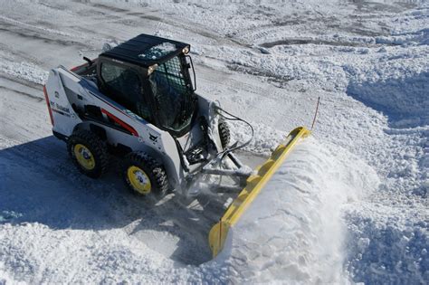 skid steer moving snow|skid steer plowing snow.